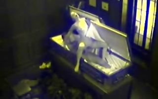 Horny brunette gets reverse cowgirl position and doggystyle in coffin