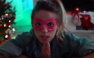 Teen beauty wearing a mask keeps blowing a huge cock