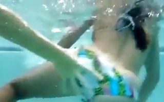 Horny amateur teens shake their asses in bikini in pool