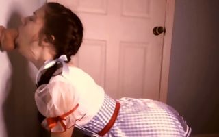 Pretty brunette sucks a dick through a glory hole in porn