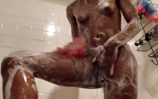 Black puffy tits teen taking a shower after masturbation